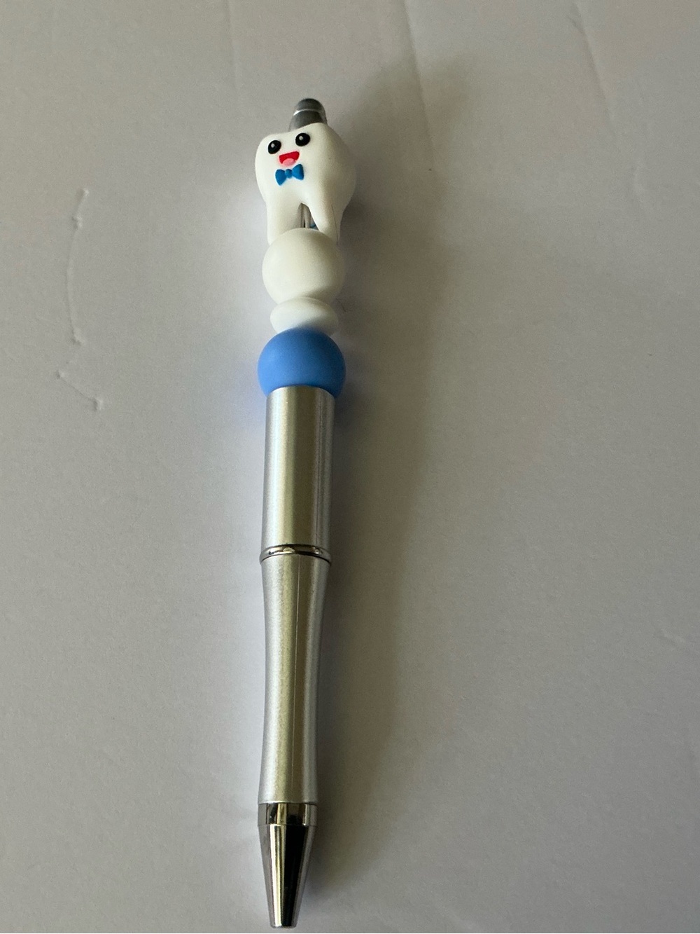 Cute Tooth Top Silver Ballpoint Pen with Blue & White Accents